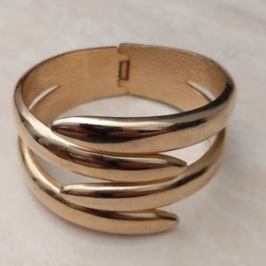 Contemporary Goldtone click bangle bracelet
